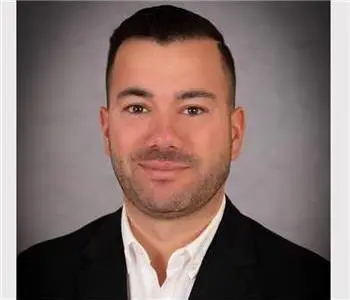 Dion M. Luzzi